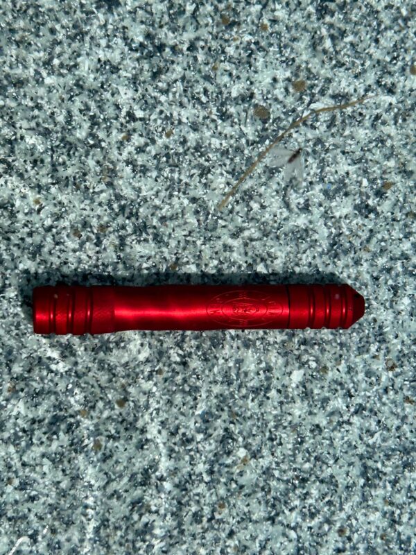 The River Tripper in Rio Red fully submerged at the bottom of a pool, keeping its contents dry